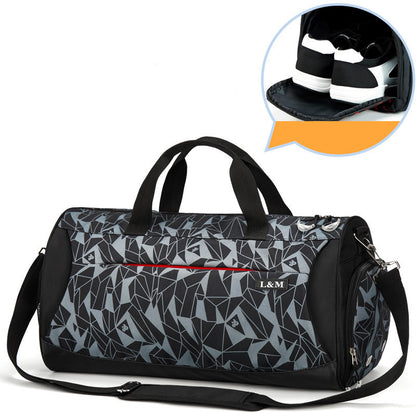 Gray geometric patterned duffel bag with black accents on a white background