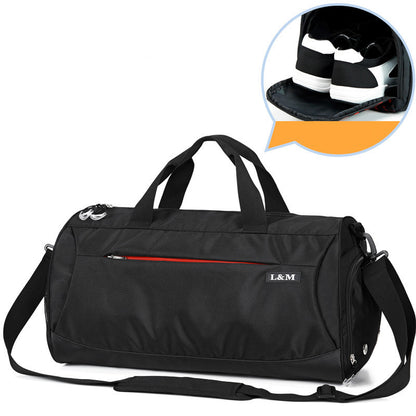 Black duffel bag with a helmet inset on a white background