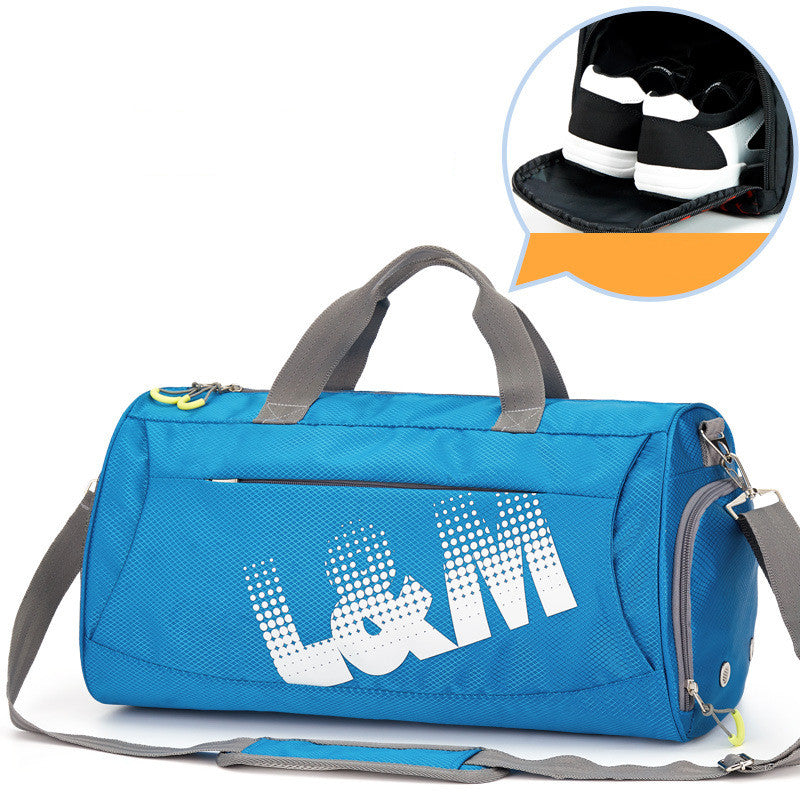 blue duffel bag with gray straps and 'l&m' branding, inset showing a helmet.
