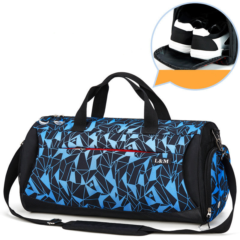 Blue duffel bag with black geometric pattern and 'L&M' branding, with a helmet inset.
